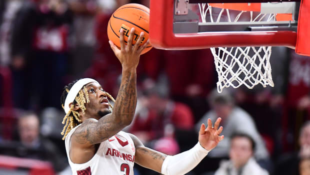 Razorbacks guard El Ellis with a layup against Texas A&M